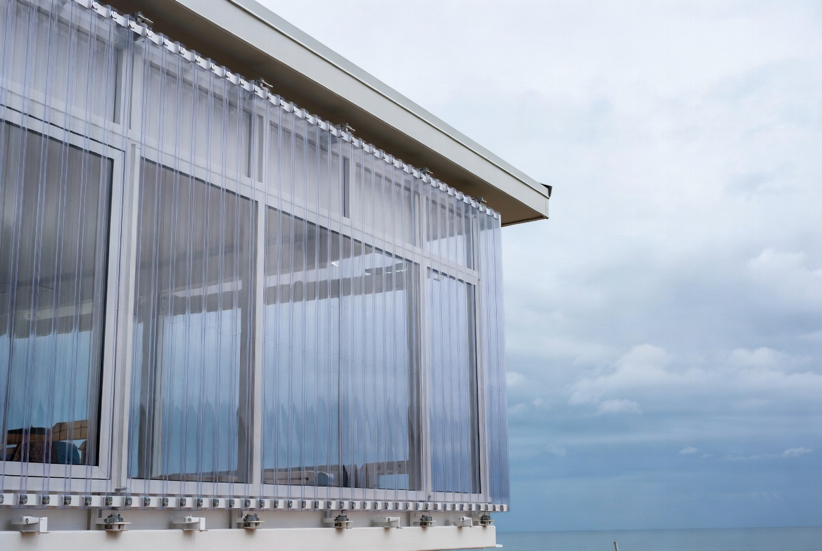 Polycarbonate Hurricane Panel On Coastal Home